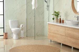 Contemporary affordable bathroom remodel featuring a minimalist interior, toilet, and shower area